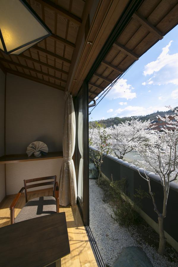 Kurotake Hotel Achi Buitenkant foto