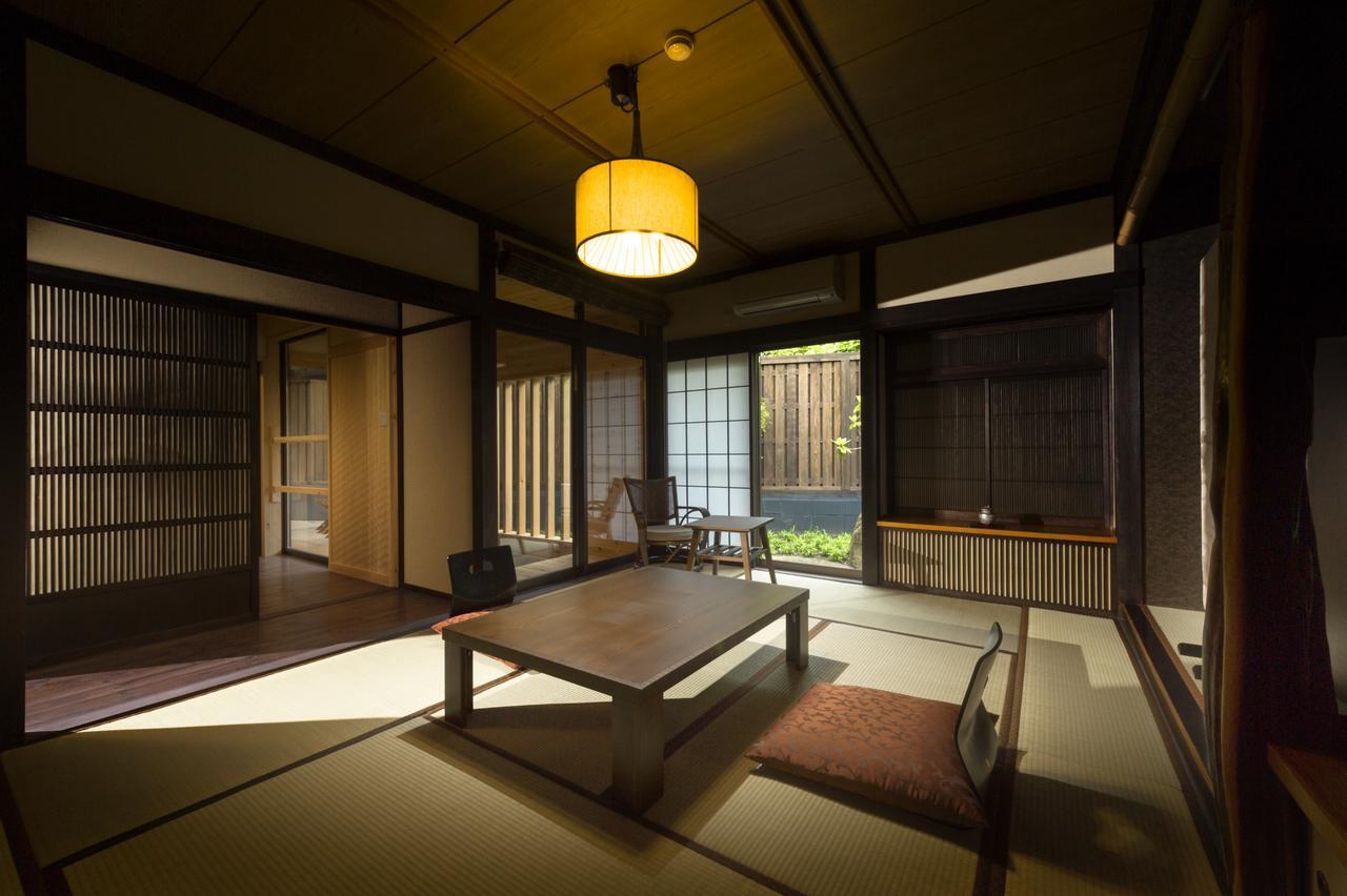 Kurotake Hotel Achi Buitenkant foto